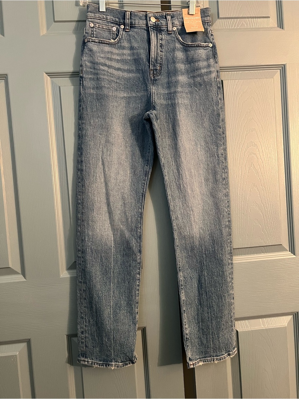 90s Straight High Rise Straight Jeans sizes 24, 26 and 29.